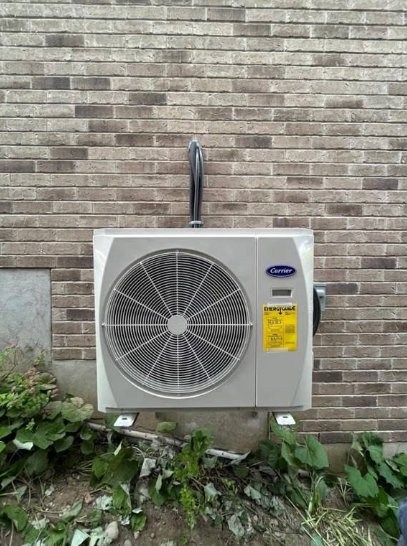 Mozee Gas Heating & Cooling — Carrier heat pump installation